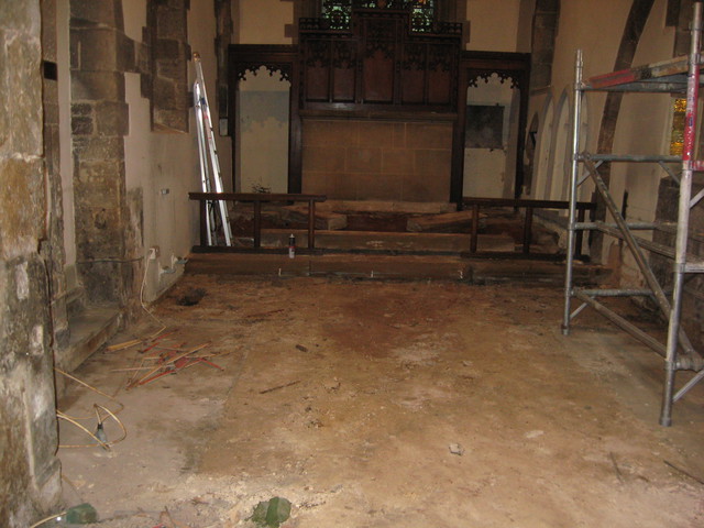 Chancel floor: Note the tunnel hole in the floor on the left